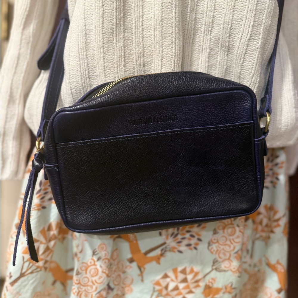 Portable leather royal blue crossbody purse. Never used.